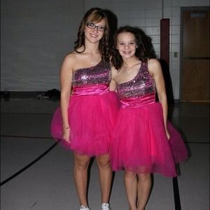 The pink dress on me the shorter one