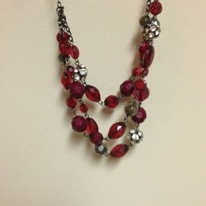 Silver grey black and red layered necklace.