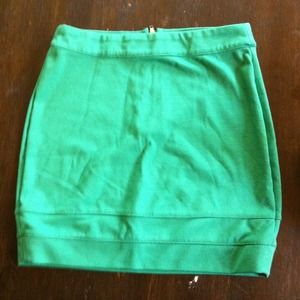 Turquoise mini skirt.