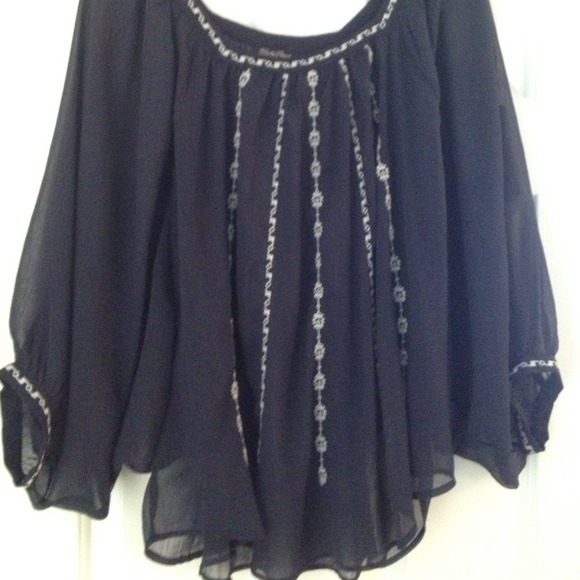 Sheer blouse.