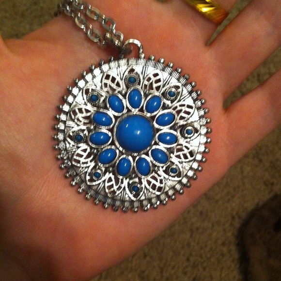 14" long blue and silver medallion necklace.