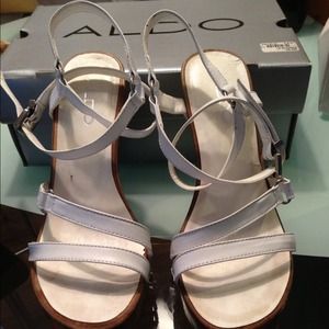 Wood and white leather Aldo heals