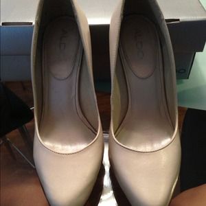 Cream and wood Aldo pumps