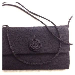 A black dress Clutch