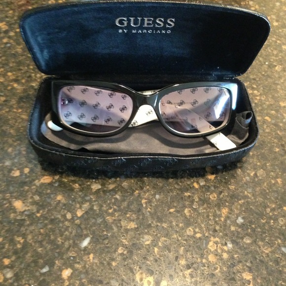 Guess By Marciano sunglasses with case and cloth