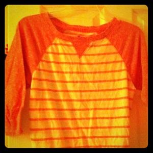 A pink and white stripped baseball shirt!