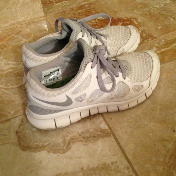 White/grey nike free runs