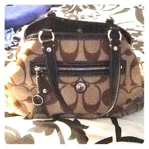 Light and dark brown coach purse