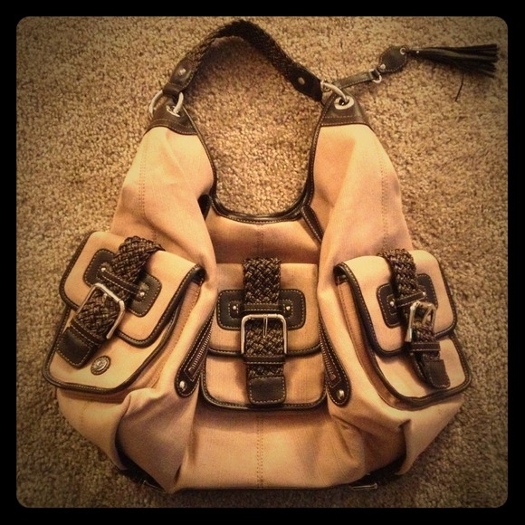 Brown hand bag with brown leather lining