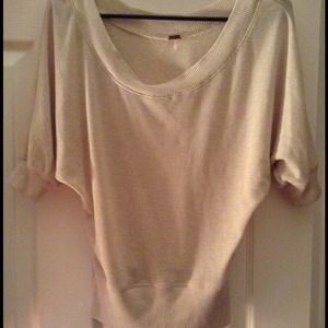 Loose fit on shoulders and fit around stomach