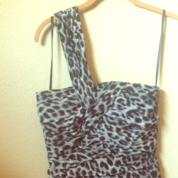 One shoulder Calvin Klein leopard cocktail dress.