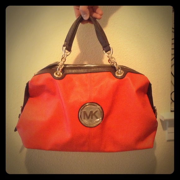 SOLD!!Coral purse- NWT  Comes with dust bag