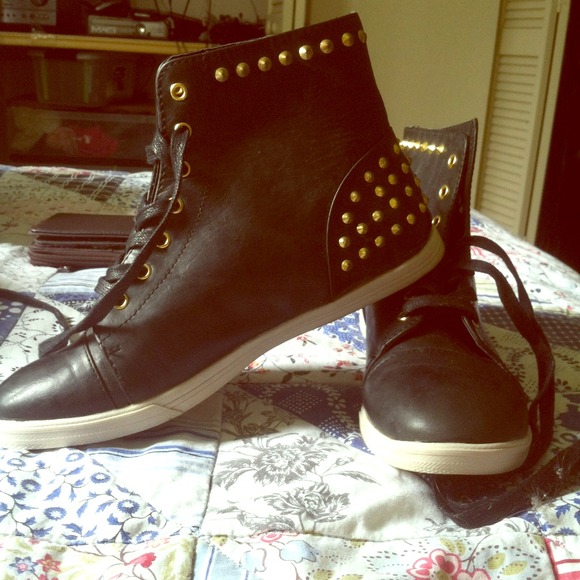 Bnever been worn shoes with gold spikes;)