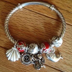 Brighton Lovely hinged charm bracelet. Holding