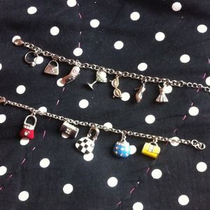 $5 for both. Cute Girly Girl Charm Bracelets.