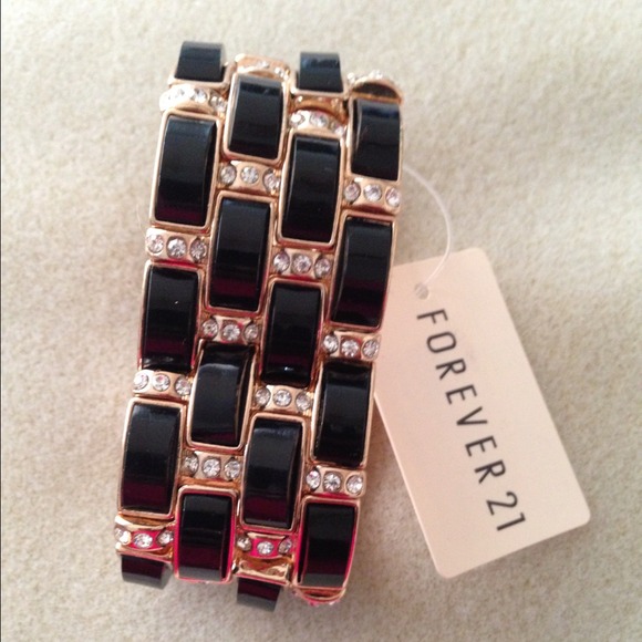 Black, gold bracelet