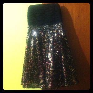 Black strapless with gold sequins.