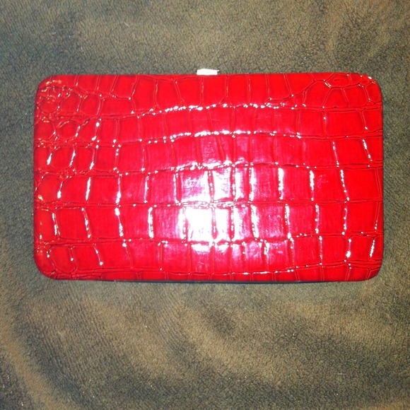 Red, snake skin wallet.