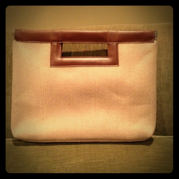 Beige canvas and leather clutch