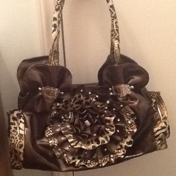 Couture flower cheetah handbag