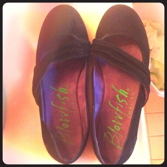 black flats with removable strap over top.