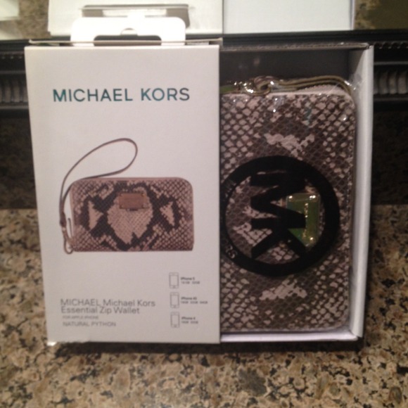 Brand new Micheal Kors wristlet in box