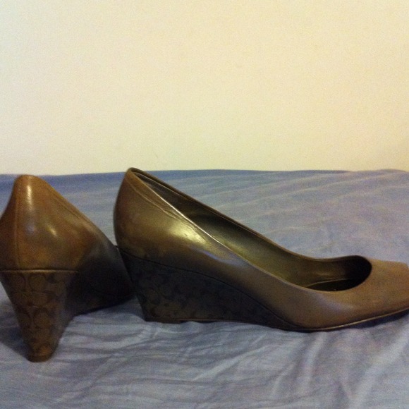 ReducedAuthentic COACH peep toe wedge. Never worn.