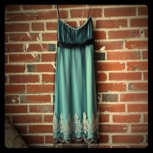 Holiday cocktail dress with silver detailing