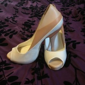 Platform peep-toe heels. Reduced the price.
