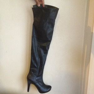 Black thigh high boots. Reduced the price.