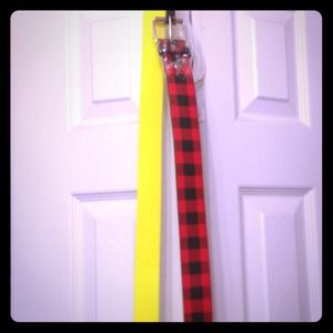 One neon  yellow and one red and black belt.