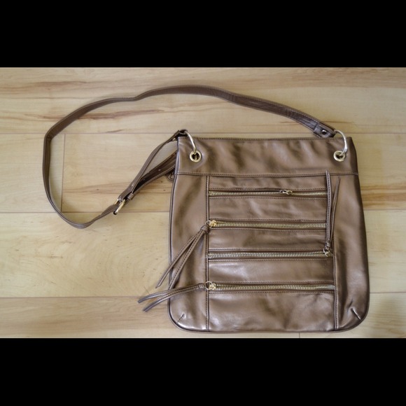 Adorable gold purse with long adjustable strap