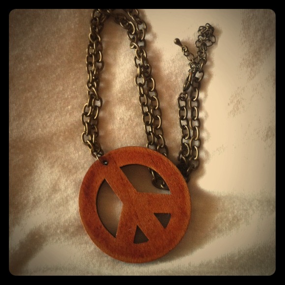 Peace sign necklace with bronze chain.