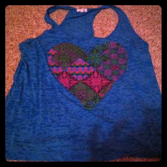 Sheer blue tank top with heart design.