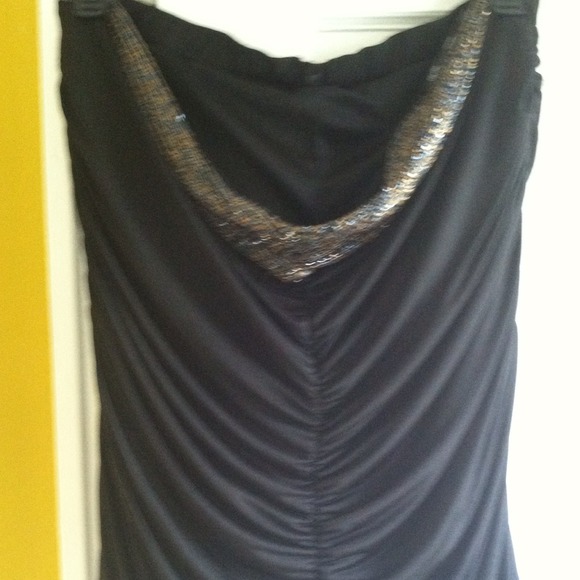 Jeweled and ruched, strapless top.  Dark blue.