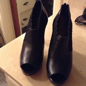REDUCED. Calvin Klein peep-toe booties.