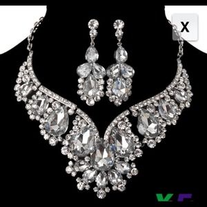Silver necklace and earring set. SOLD