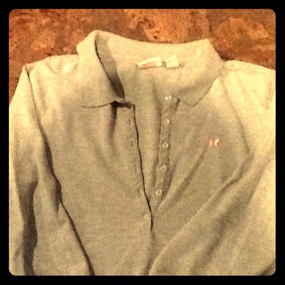3/4 sleeve polo style top. Slim fit