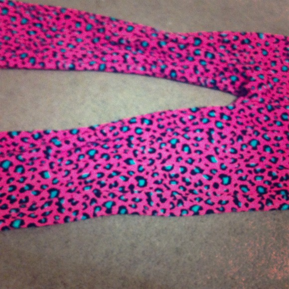A pair of pajama pants with cheeta print pattern