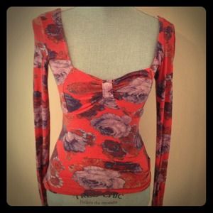 Free people shirt and necklace.