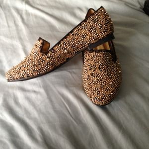 Spiked leopard flats