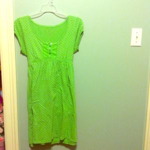 Green dress with white dots and cute bow in back!