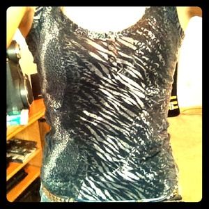 the second picture is the back of the tank top!