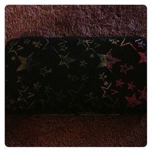 Black wallet with red yellow and green stars