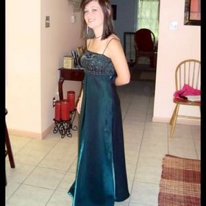 A floor length sequined dress by Linda Burnell