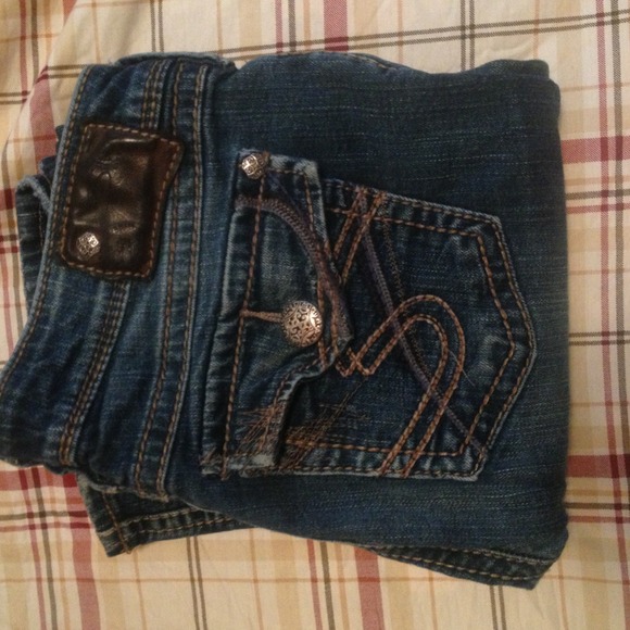 SOLD!(:  Silver jeans.