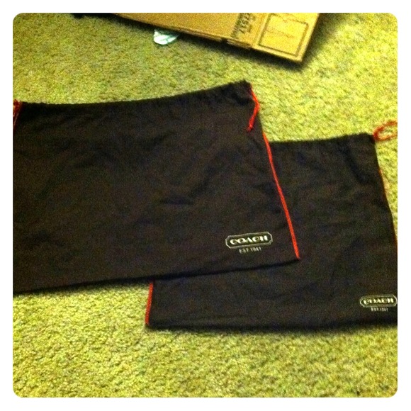 Two Coach dust bags.