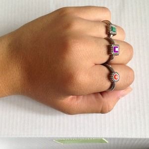 Green, Purple, and Green stoned rings.