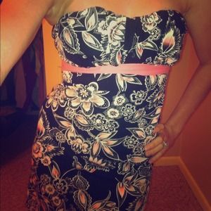 Black and white floral dress with pink wrap belt