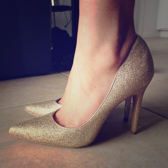 Gold pointy heels